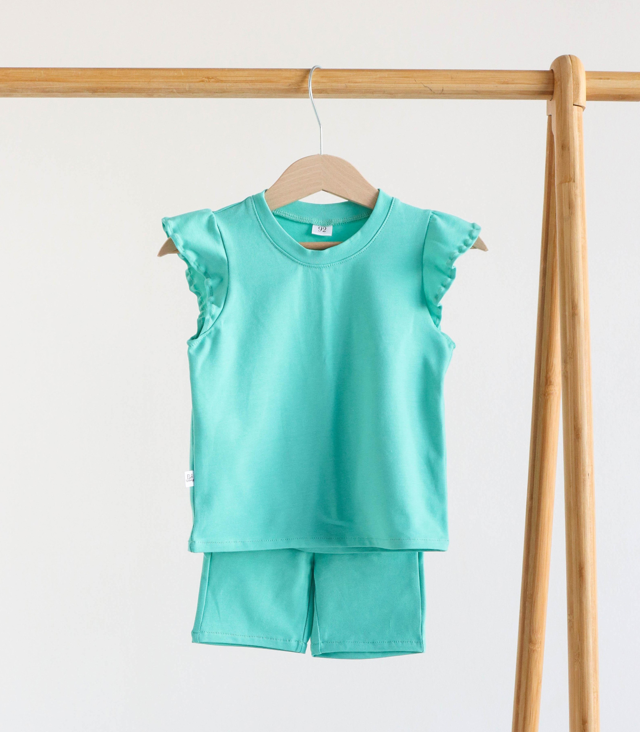 Трикотажний костюм футболка+велосипедки “М’ятний”